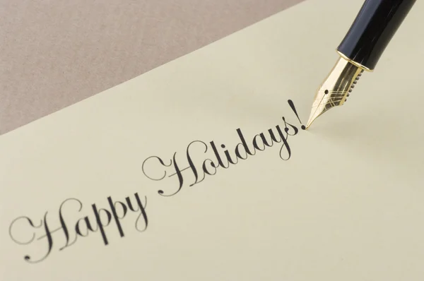 金のペンと碑文の幸せな休日 — ストック写真