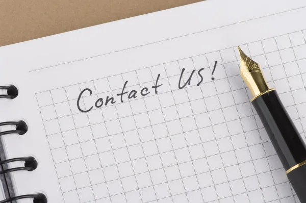 Inscription Contact us with gold pen — Stock Photo, Image