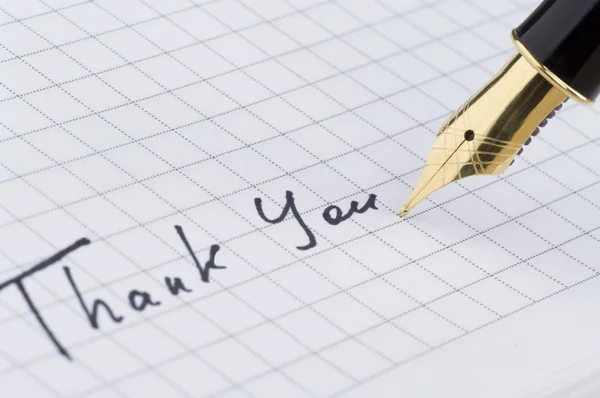 Inscrição Obrigado com caneta de ouro — Fotografia de Stock