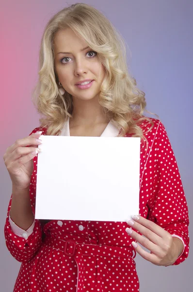 Woman showing a blank smiling — Stock Photo, Image