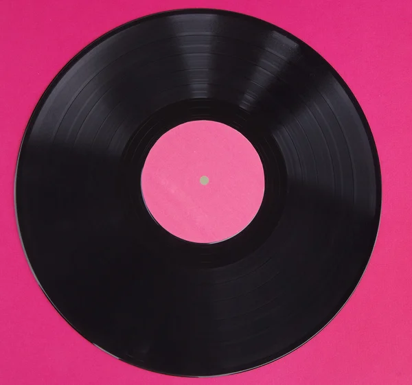 Vinylskiva på pink — Stockfoto