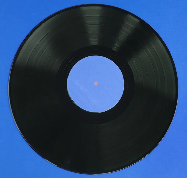 Vinylskiva på blå — Stockfoto
