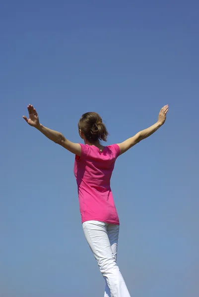 Girl on sky background — Stock Photo, Image