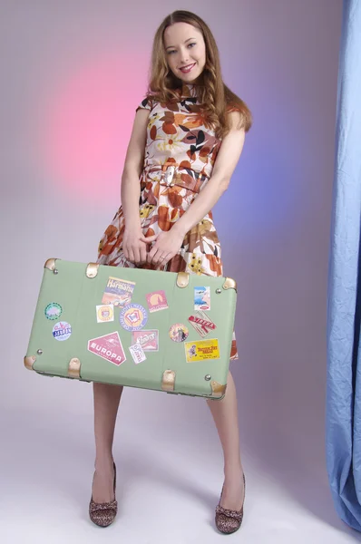 Vintage girl with travel bag — Stock Photo, Image
