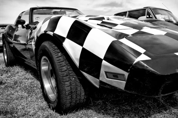 PAAREN IM GLIEN, GERMANY - MAY 26: The Chevrolet Corvette C3 (Black and White), "The oldtimer show" in MAFZ, May 26, 2012 in Paaren im Glien, Germany — Stock Photo, Image
