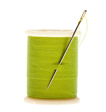 Spool of thread and needle clipart