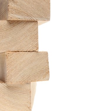 Stack of wooden 2X4s on white background with copy space. clipart
