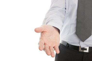 Businessman hand reaching to help or collect clipart