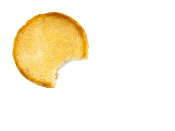 Round rusk with bite missing, isolated on a white background — Stock Photo, Image