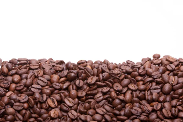 stock image Partially filled with roasted coffee beans background