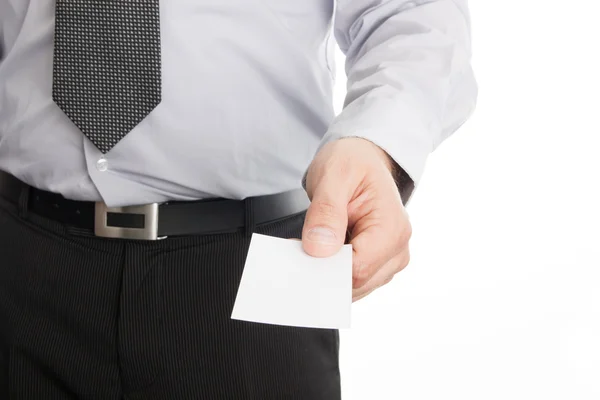 Businessman holding empty business card in his hand — Stock Photo, Image