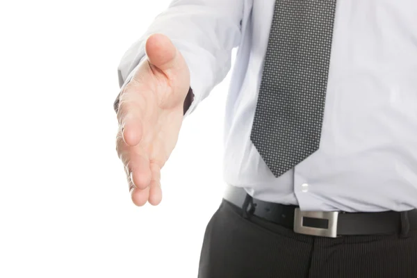 Businessman reaching out to shake hands — Stock Photo, Image