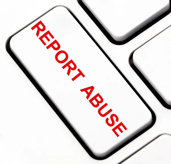 Report abuse button on keyboard — Stock Photo, Image