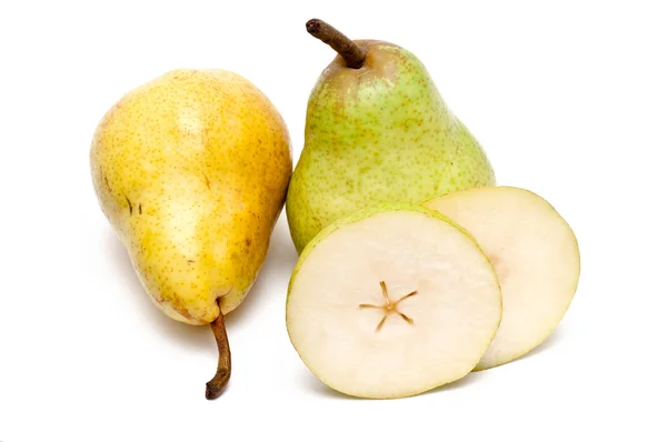 Yellow and green pear and some slices — Stock Photo, Image