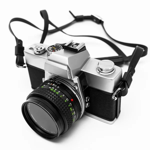Câmera digital isolada em fundo branco DSLR — Fotografia de Stock