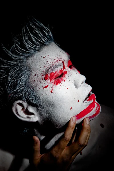 stock image Young asian male with red paint fashion makeup