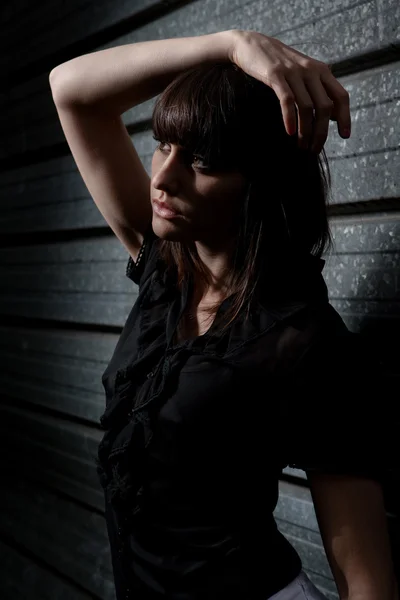 stock image Young caucasian woman posing at night