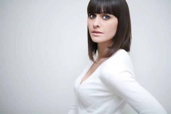 Young caucasian woman with fringe/bangs — Stock Photo, Image