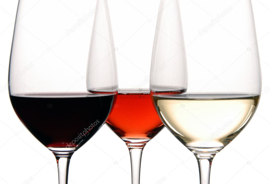Three Wine Glasses Filled with White, Rosé and White Wine