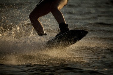 Woman on his wake board clipart