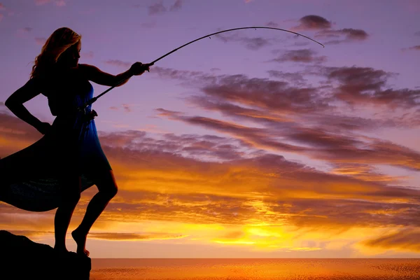 Woman fish pole sunset — Stock Photo, Image