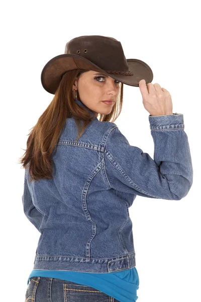 Woman in levi jacket hand hat back — Stock Photo, Image