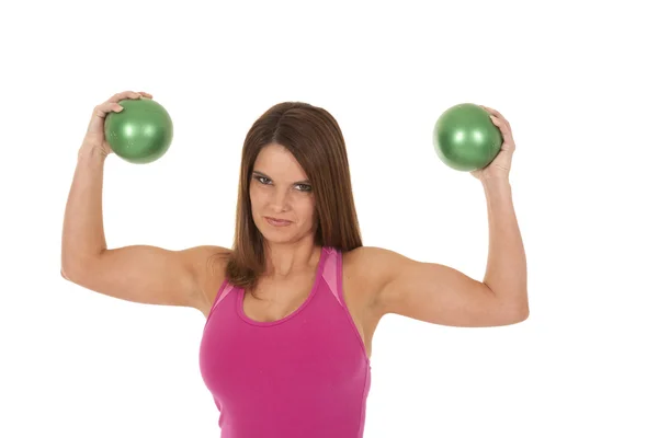 Woman muscles green balls — Stock Photo, Image