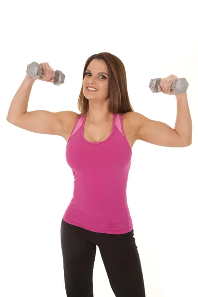 Woman pink tank show weights — Stock Photo, Image