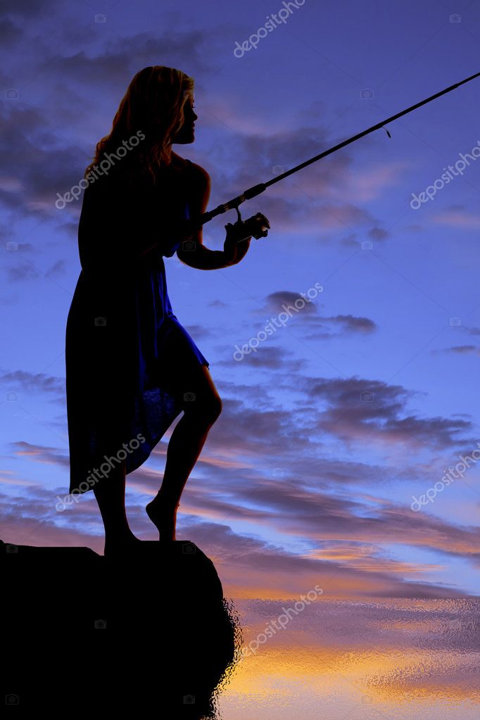 Woman fishing sunset stand — Stock Photo © alanpoulson #11945368