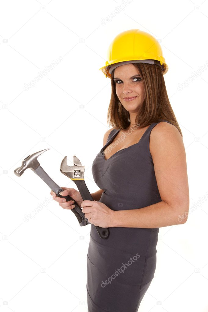 woman hard hat tools smile stock photo alanpoulson 11948890