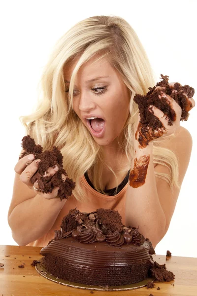 Woman cake in hand ready to bite — Stock Photo, Image