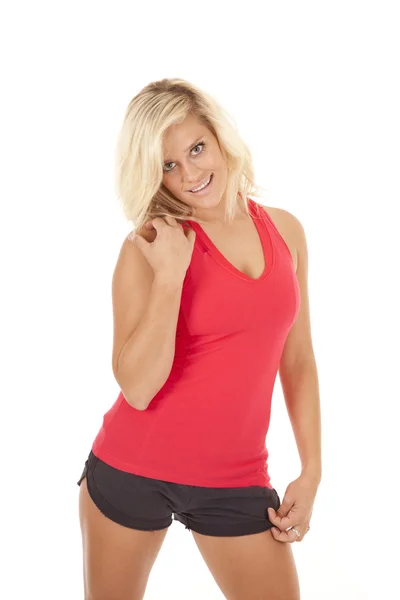 Mulher vermelho top shorts sorriso fitness — Fotografia de Stock