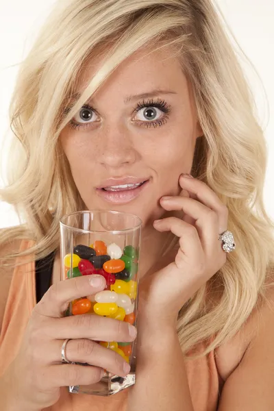 stock image Woman smile glass of candy