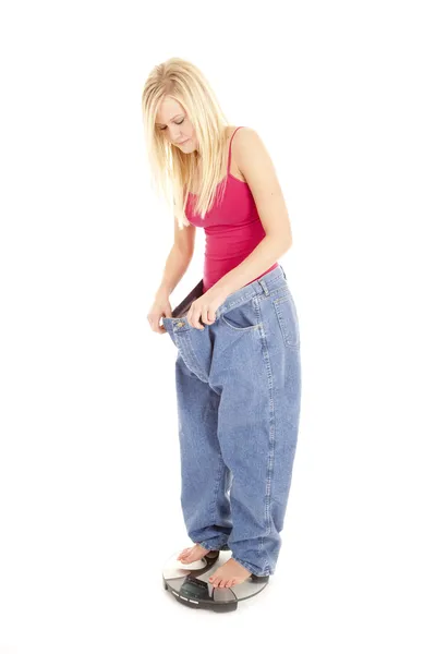 Duże spodnie wagi patrzeć w dół — Zdjęcie stockowe