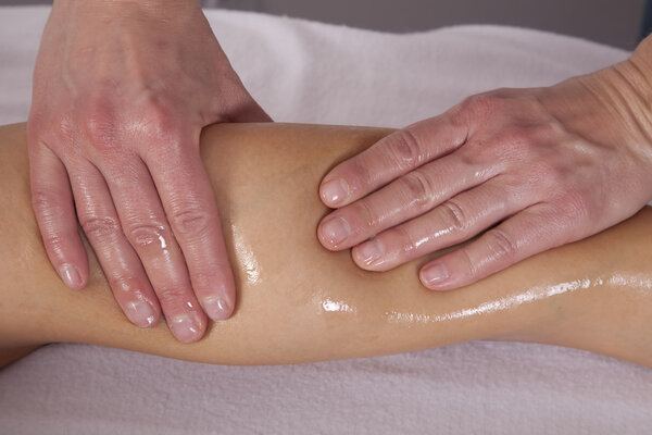 Leg getting massaged