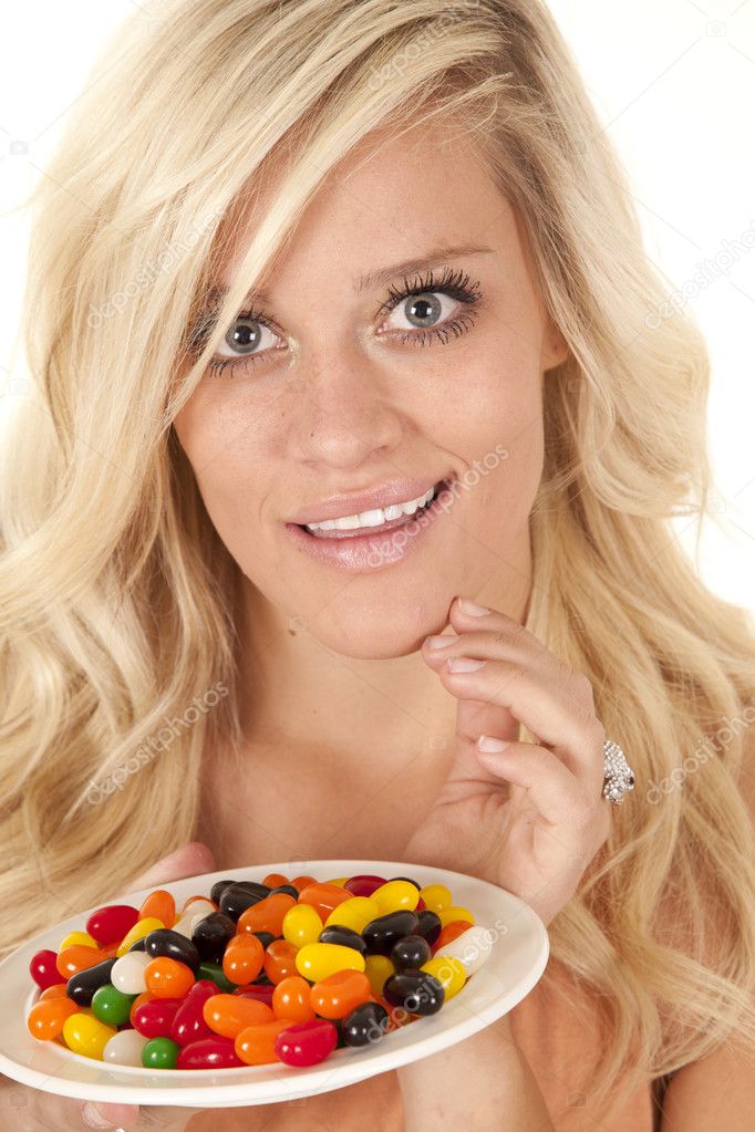 Woman smile jelly beans — Stock Photo © alanpoulson 11955828
