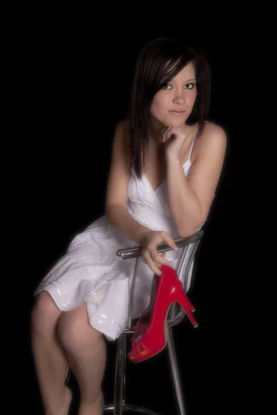 Žena červené boty na černém pozadí — Stock fotografie