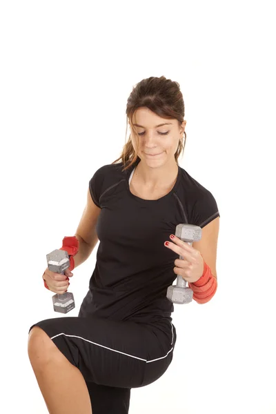 Woman in black weights leg up — Stock Photo, Image