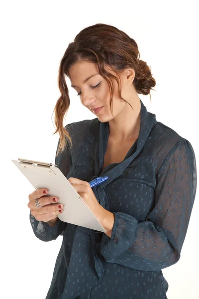 Kobieta notatniku pisze — Zdjęcie stockowe