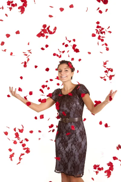 Woman showered with roses — Stock Photo, Image