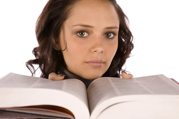 Vrouw boek door gezicht — Stockfoto