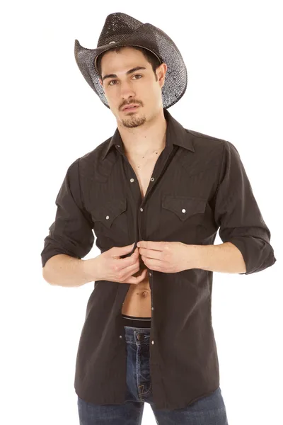 Buttoning koszula w kowbojem — Zdjęcie stockowe