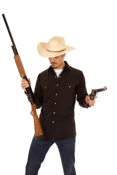 Cowboy segurando duas armas — Fotografia de Stock