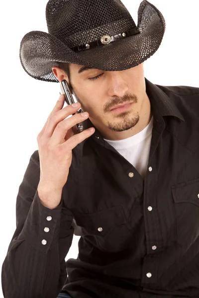Cowboy on phone eyes closed — Stock Photo, Image