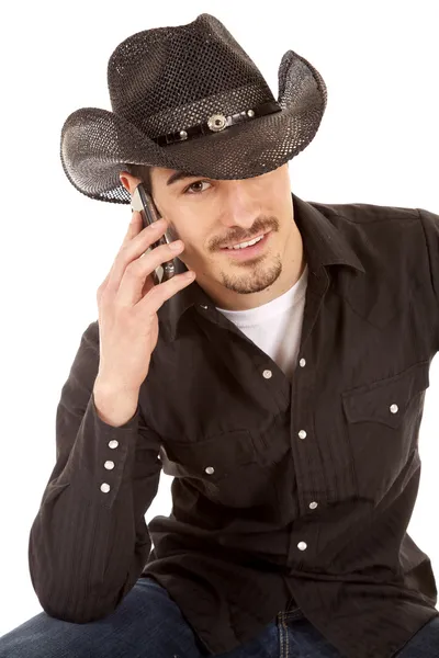 Cowboy op telefoon glimlach — Stockfoto