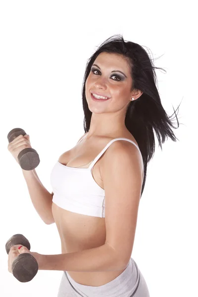 Woman working with weights sports bra — Stockfoto