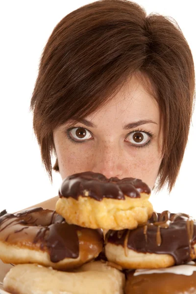 Cara sobre donuts — Fotografia de Stock