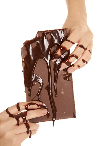 Hands covered in chocolate — Stock Photo, Image