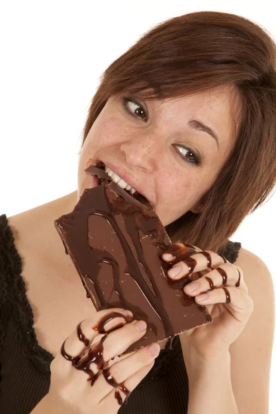 Naschen an Schokolade — Stockfoto