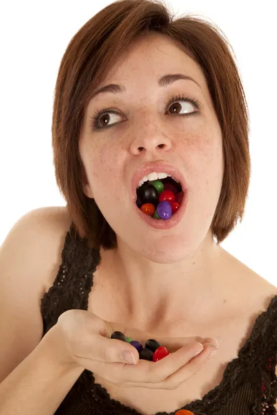 Mouth loaded jelly beans — Stock Photo, Image